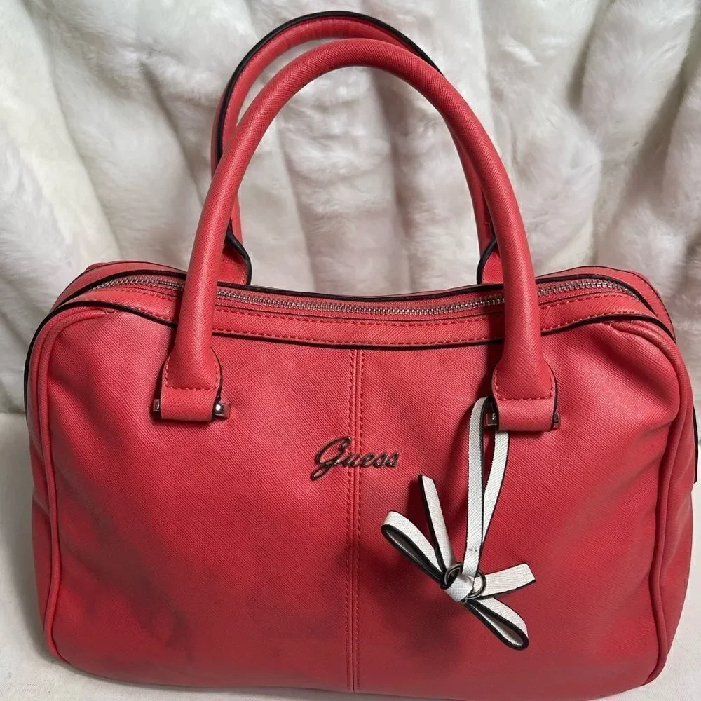 Guess bright orange satchel/Shoulder bag with gold tone hardwares.